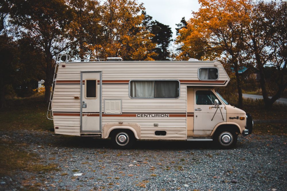 brown centurion rv truck scaled e1637922463822